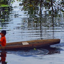 Boy in a logboat